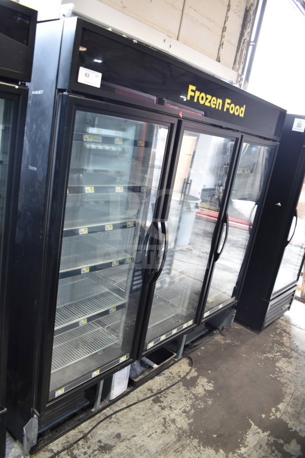 2020 True GDM-72F-HC commercial 3-door reach-in freezer merchandiser, black, tested and working, glass doors, model visible.