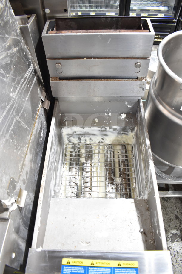 2023 Pitco Frialator SG14 commercial deep fryer, natural gas, 110,000 BTU, in used condition, shown with cooking residue.