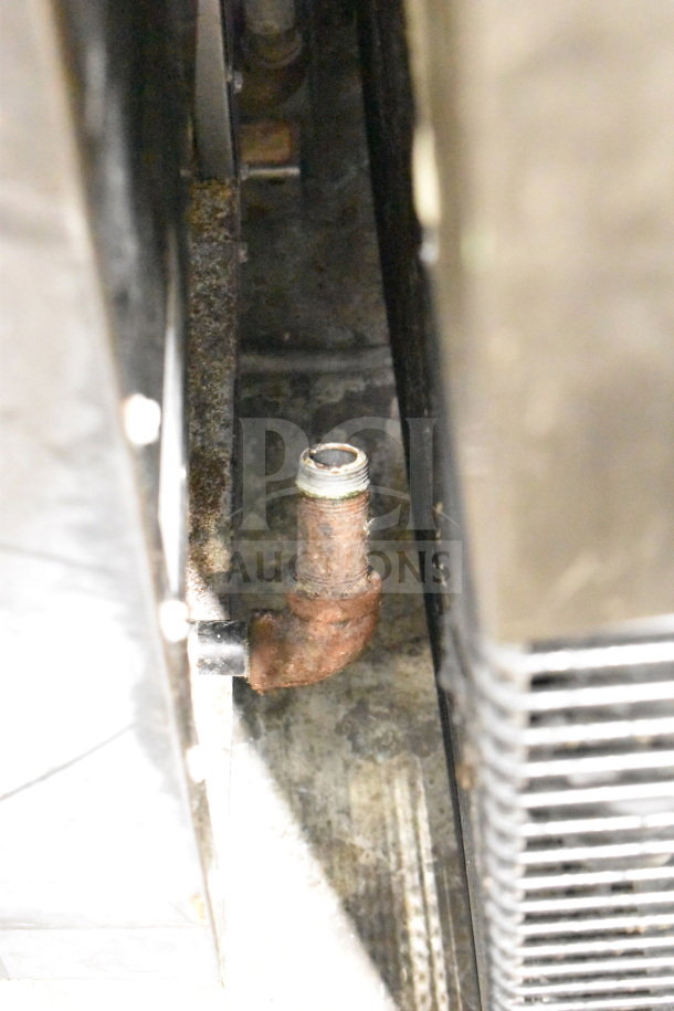 2022 Cooking Performance Group 351FFOP50N gas deep fryer, 120,000 BTU. Image shows part of pipe and internal structure, exterior condition.