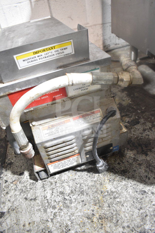ME50 Commercial Portable Oil Filter, 120 Volts, 1 Phase. Visible labels include maintenance warnings. Used condition.