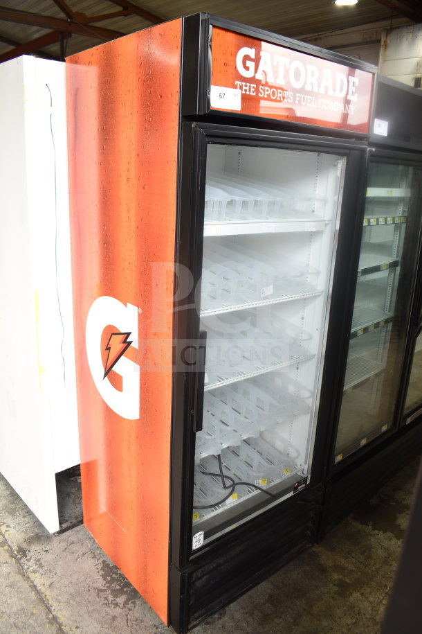 True GDM-26 commercial cooler, single glass door, Gatorade branding, 115V, 1 phase, excellent condition, empty shelves.