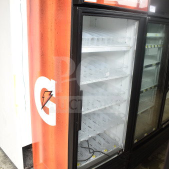 True GDM-26 commercial cooler, single glass door, Gatorade branding, 115V, 1 phase, excellent condition, empty shelves.