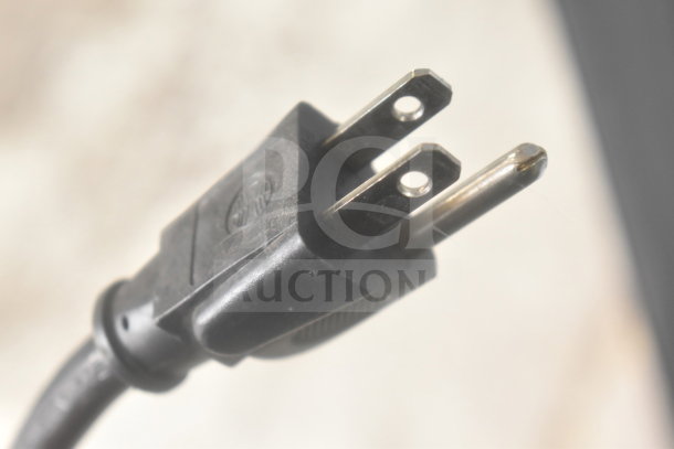 Close-up of a power plug from the True GDM-26 Commercial Single Door Cooler, 115 Volts, 1 Phase.