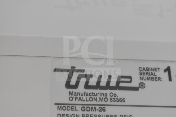 True GDM-26 cooler merchandiser label showing model and manufacturing details. 115 volts, 1 phase.