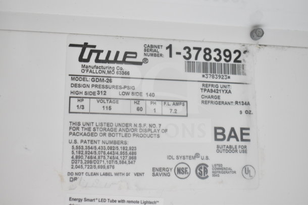 True GDM-26 reach-in cooler label showing model, voltage, and spec details. 115 volts, 1 phase, refrigerant R134A.