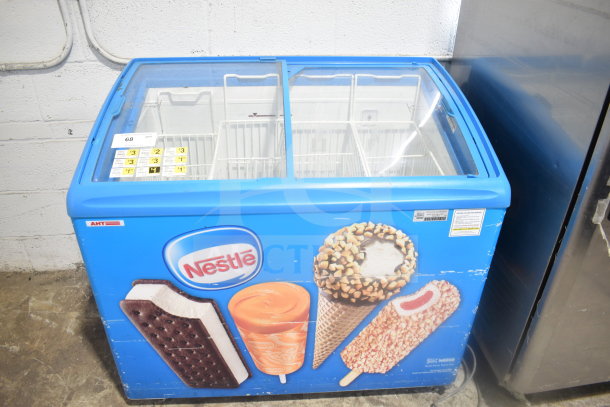AHT RIO S 100 commercial chest freezer merchandiser, 115 volts, 1 phase, with Nestle branding, features sliding glass lids.