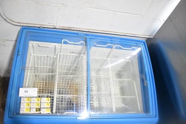 AHT RIO S 100 commercial chest freezer with blue trim, dual glass sliding doors, and interior baskets. 115 volts, 1 phase.