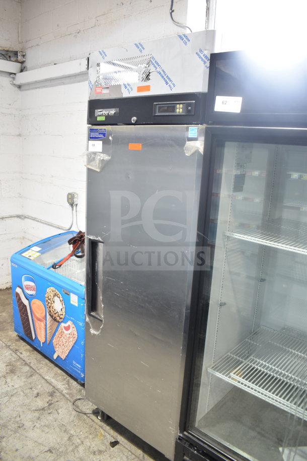 Turbo Air M3F24-1-N commercial single door reach-in freezer, 115 volts, 1 phase, stainless steel, visible dings, operational condition.
