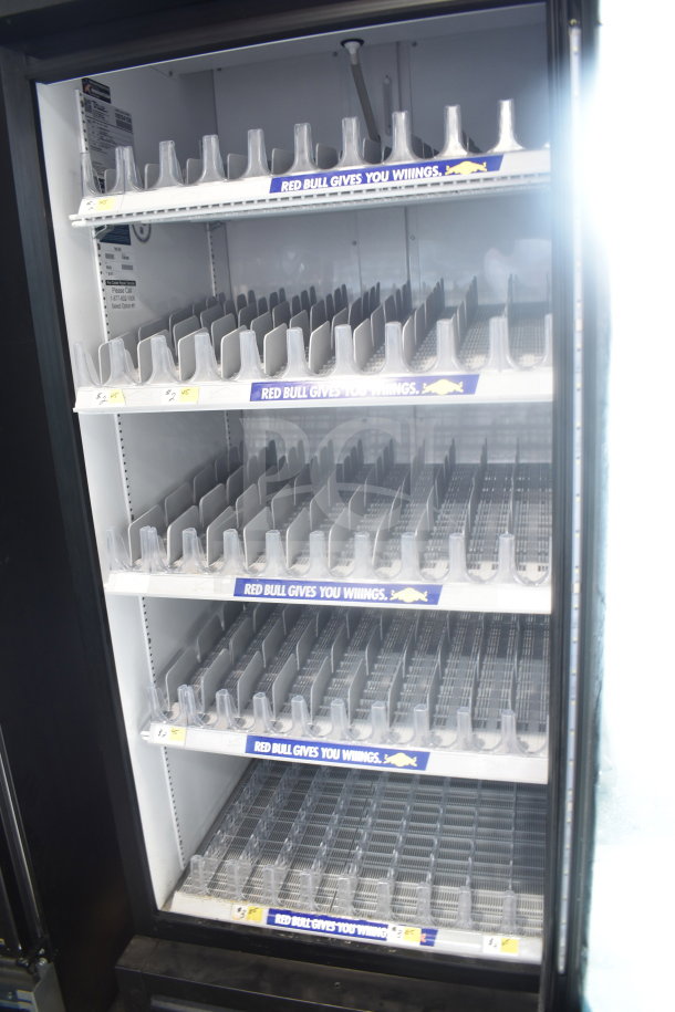 True GDM-26-HC commercial cooler, 2021 model, single door, empty shelves, 115V, Red Bull branding, excellent condition.