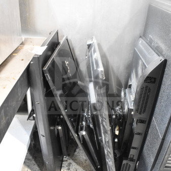 Four televisions including RCA and Philips models, propped upright. Buyer pick-up required, no shipping available.