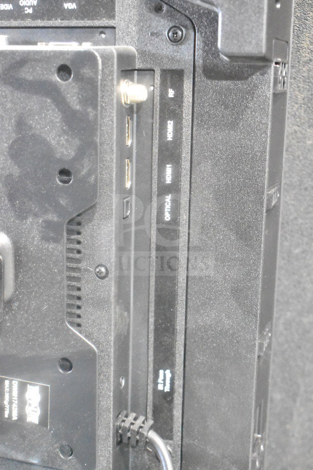 Four televisions including RCA and Philips, rear panel connections visible. Buyer pickup required.