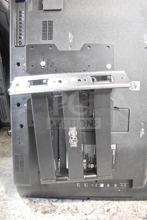 Four televisions, brands RCA and Philips, with Tripp Lite TV mounts, shown in used condition. Local pickup required.