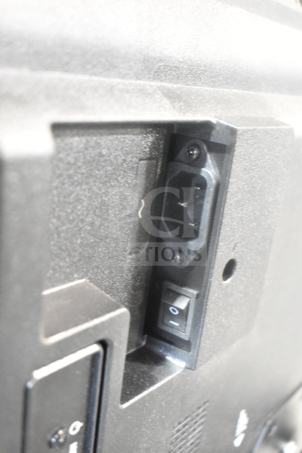 Close-up of TV back panel showing power plug and switch. Lot includes four TVs, RCA and Philips brands, for local pickup only.