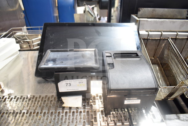 Various auction items including a POS monitor, Bixolon SRP-S300 receipt printer, and Epson receipt printer. Visible condition with stickers indicating "QTY 4X."