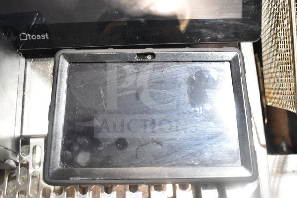 4-item lot: POS monitor with "Toast" logo, Bixolon SRP-S300 printer, Epson receipt printer. Used condition, visible marks.