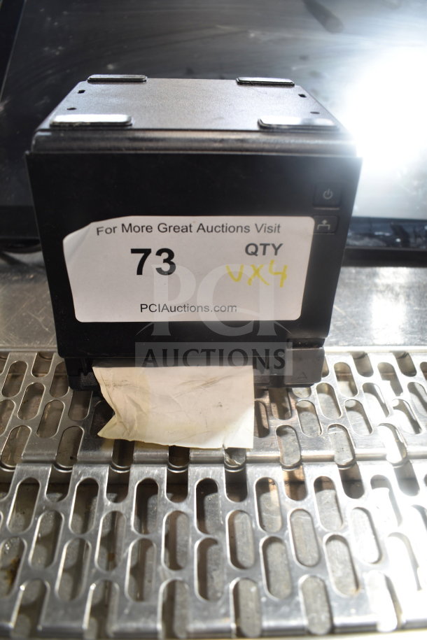 Four-item auction lot featuring POS monitor, Bixolon SRP-S300, Epson receipt printer; includes auction label with lot number 73.