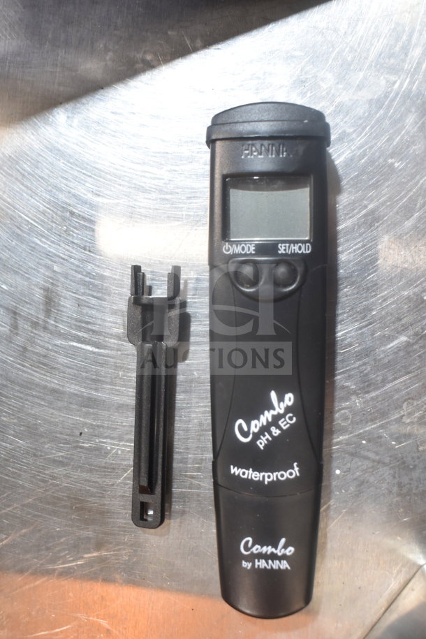 Hanna Instruments pH/EC/TDS Waterproof Meter in good condition, featuring a digital display and control buttons.