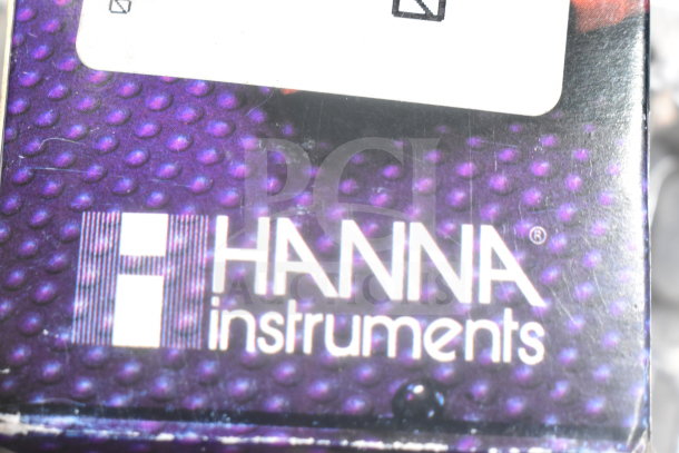 Hanna Instruments pH/EC/TDS waterproof meter box with branding visible.