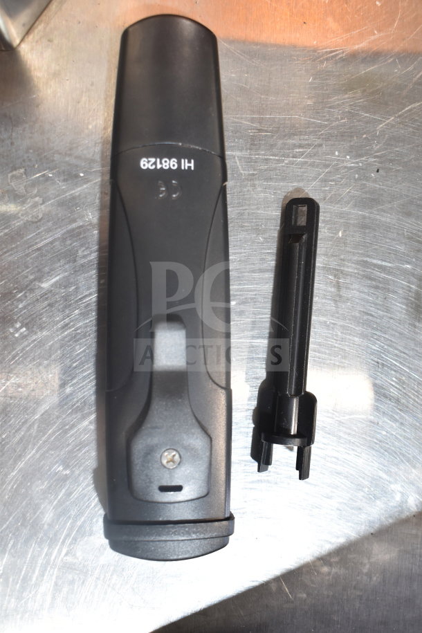 Hanna Instruments pH/EC/TDS Waterproof Meter, model HI 98129, in excellent condition, shown with probe on metal background.
