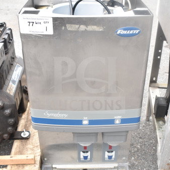 Follett 12CI400A commercial countertop ice and water dispenser, 115 volts, with dual spouts, stainless steel, and visible brand logo.