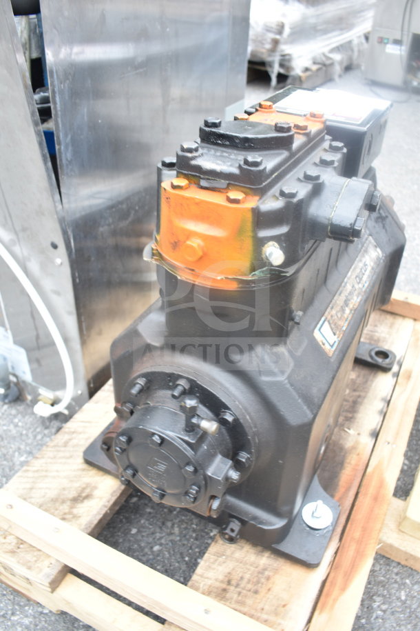 Copeland Discus 3DKHA120L-TFD-227 Compressor on pallet, showing moderate wear, model and label visible.