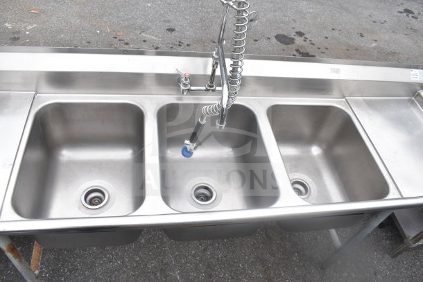 Advance Tabco commercial 3 bay sink with dual drain boards, stainless steel, includes pre-rinse faucet, good condition.
