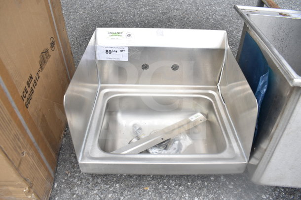 Regency 600HS17SP 17" x 15" stainless steel wall-mounted hand sink, brand new with minor scratches. NSF certified.