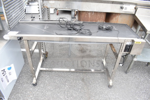 Vevor Belt Conveyor, 110 Volts, 1 Phase, stainless steel frame, black belt, control panel on side, fair condition.