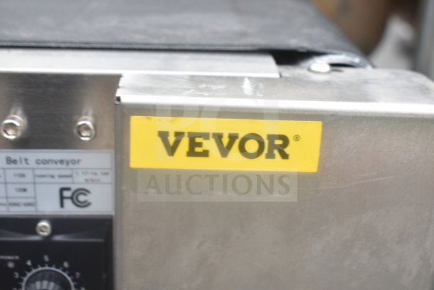 Vevor Belt Conveyor, 110 volts, 1 phase. Features durable metal construction. Vevor logo displayed on the side.