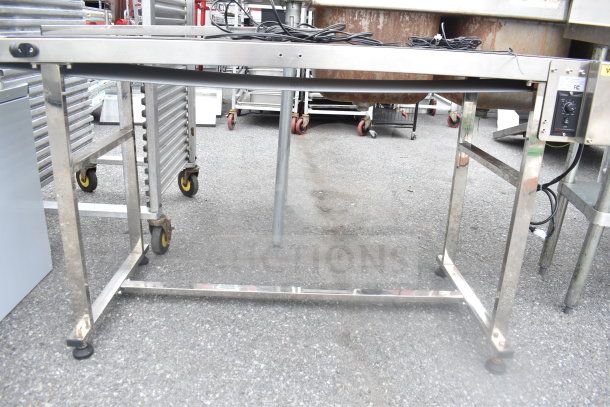 Vevor Belt Conveyor, 110V, 1 Phase. Stainless steel frame, used condition, adjustable speed control, mounted on wheels.