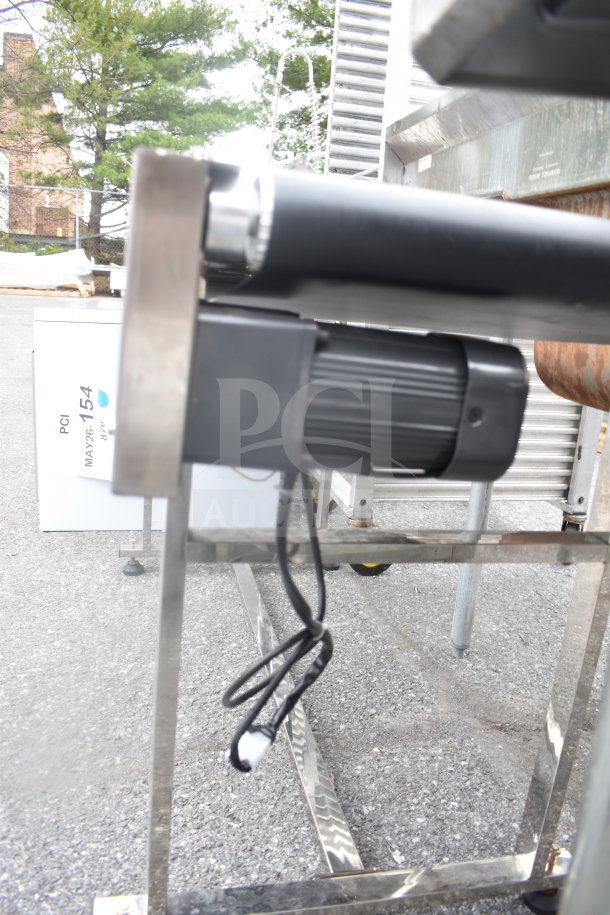 Vevor Belt Conveyor, 110 volts, 1 phase, in metal frame. Motor visible, wiring intact, suitable for industrial use.