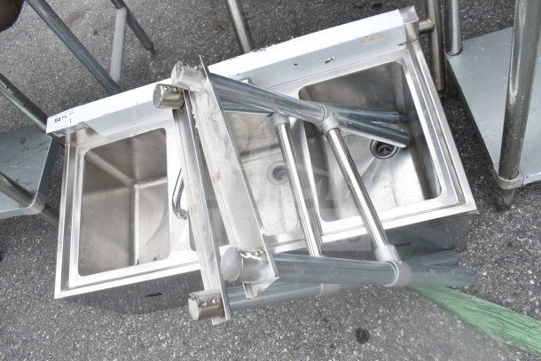 Steelton 522BS3T38 Commercial 3 Bay Sink, stainless steel, includes disassembled legs, visible surface wear, for industrial use.
