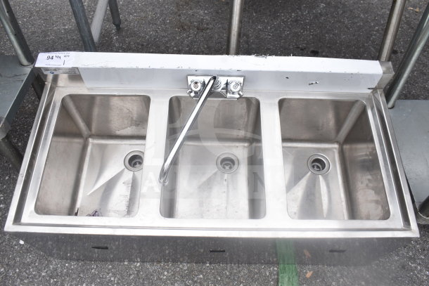 Steelton 522BS3T38 Commercial 3 Bay Sink; stainless steel, good condition, visible faucet and drains.