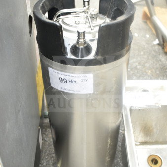 Stainless steel home brew keg with black handles, top valve, and auction label showing number 99619. Good condition.