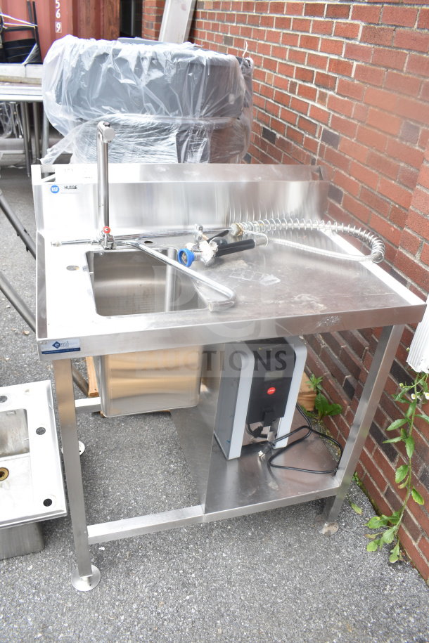 Stainless steel table with sink bay, featuring Marco 10018805BX beverage system. Includes faucet and spray hose. Good condition.