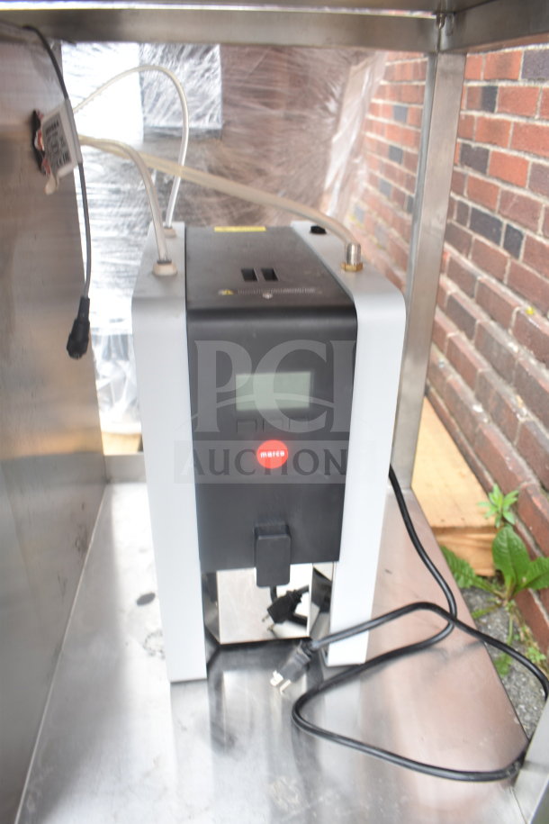 Stainless steel table with sink bay and Marco 10018805BX beverage system, featuring digital display and power cables.
