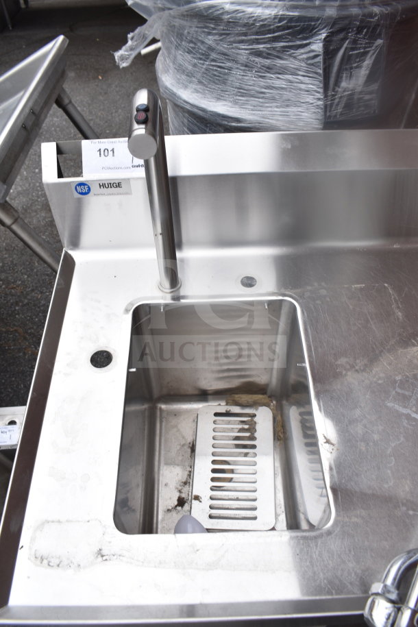 Stainless steel table with integrated sink bay and Marco 10018805BX beverage system, NSF certified, signs of use.