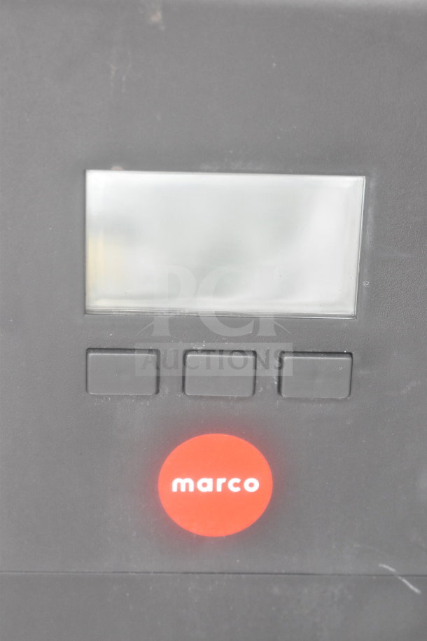 Marco 10018805BX Beverage System control panel with logo and buttons visible, part of a table with sink bay setup.