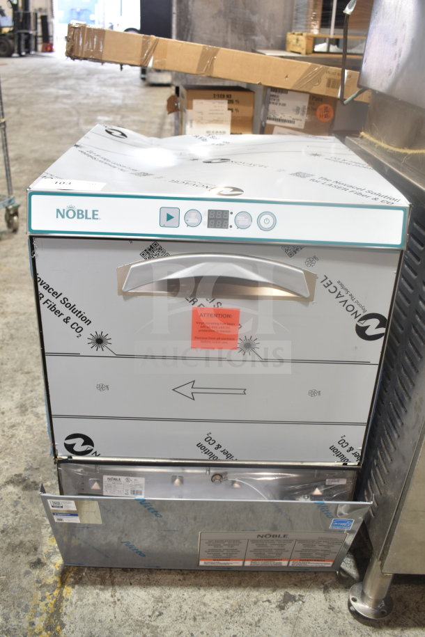 Brand new Noble 495LTUC24 commercial undercounter dishwasher, 120V, 1 phase, low-temp, visible protective covering.
