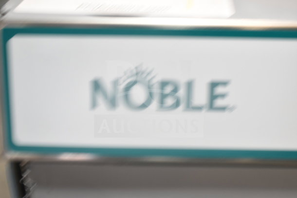 Brand new Noble 495LTUC24 undercounter dishwasher, 120V, 1 phase. Scratch and dent model with brand logo visible.