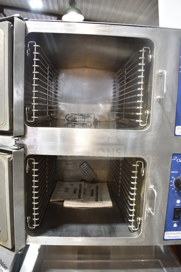 Cleveland 24CEM24 commercial double-deck convection steam cabinet, electric, 440/480V, 3 phase, stainless steel interior, clean condition.