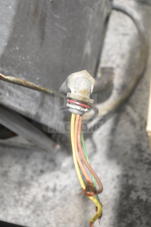 Cleveland 24CEM24 steam cabinet wiring detail, showing worn multi-colored wires and connector. Model: 24CEM24.