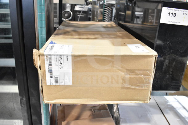 Cardboard box containing BRAND NEW SCRATCH AND DENT FML-4VS black thermoplastic flush mount vertical 4-slot lid holder with straw slot. Label visible on the side.
