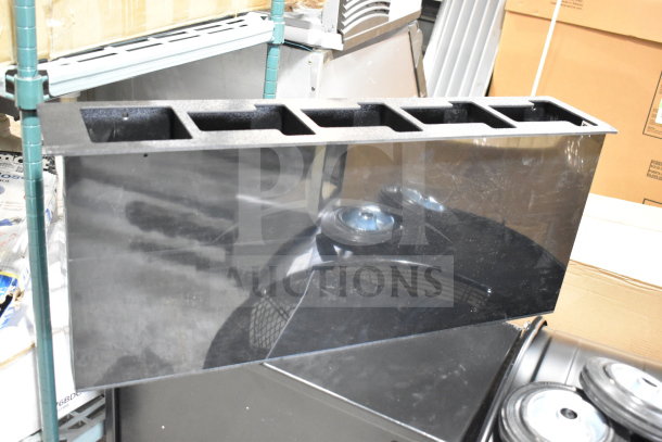Vollrath black thermoplastic 4-slot lid holder with straw slot, flush mount design, new condition.