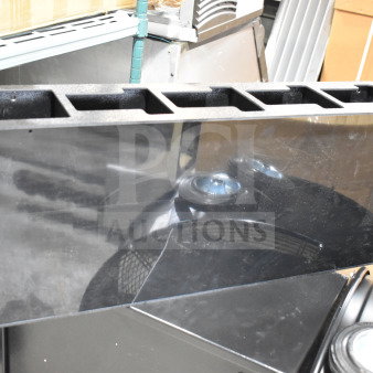 Vollrath black thermoplastic 4-slot lid holder with straw slot, flush mount design, new condition.