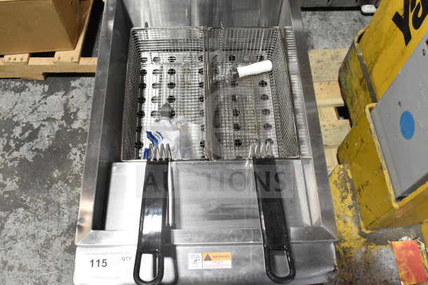 BRAND NEW Cooking Performance Group FCPG30 Liquid Propane 30 lb. Fryer with dual baskets, minor exterior dents visible. 53,000 BTU.