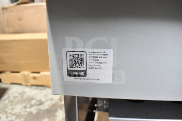 BRAND NEW 2025 Cooking Performance Group FCPG30 Liquid Propane Fryer, 30 lb, 53,000 BTU, with QR code label for product info.
