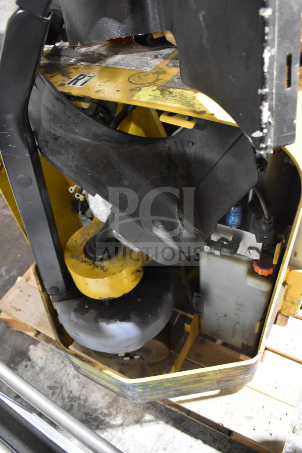 Yale E Industrial Walkie Stacker, yellow and black, exposed interior parts. Used condition, markings on components visible.