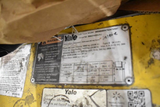 Yale E Industrial Walkie Stacker with model MSW040SFN24TV087. Features include 1070mm forks, 24V, 1423kg max battery weight. Serial No. B895N02629J.