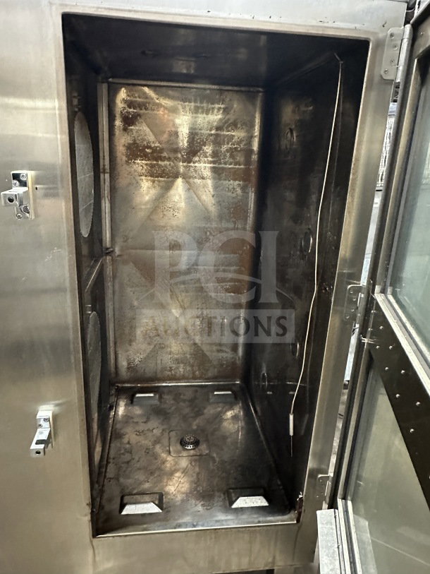 Alto-Shaam Combitherm 2020G commercial stainless steel combi oven, natural gas, full-size roll-in rack, on legs, inside view.